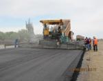 Laying of High porous asphalt concrete base course 