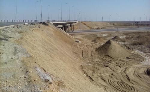 It is not performed works on arrangement of filled shoulders, protection of cone slopes at bearing No.5  of overpass by in-...