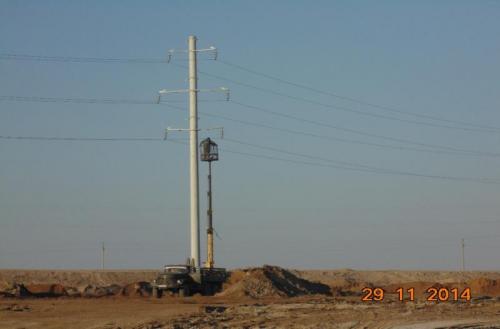 Reconstruction of PL -35 kw at transport interchange two levels at intersection Akkyr Zhalagash.  Wire hanging PL-35 kw at post 