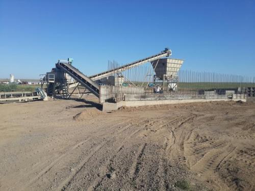 Installation of mechanical Plenty  for crushed-sand mixture with  addition of cement