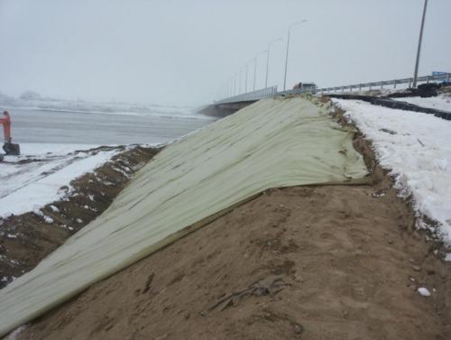 Constructions of geotextile under geogrids on high embankments PK684+00