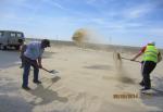 Расчистка барханного песка после бури