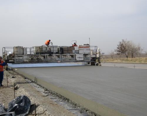 Concrete pavement laying process