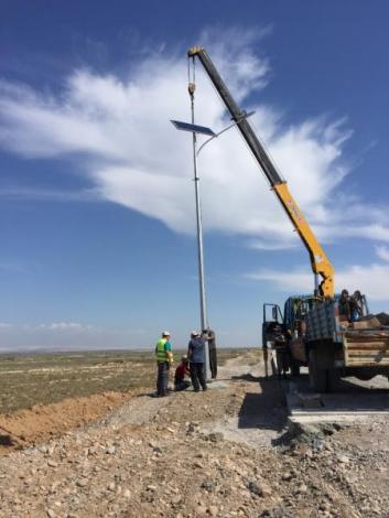 Installation of lighting poles on overpass 721+17 through the r/w