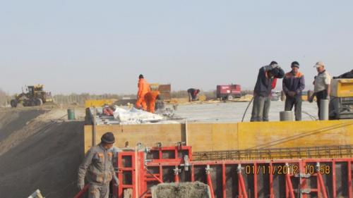 Construction of abutment wall at overpass 